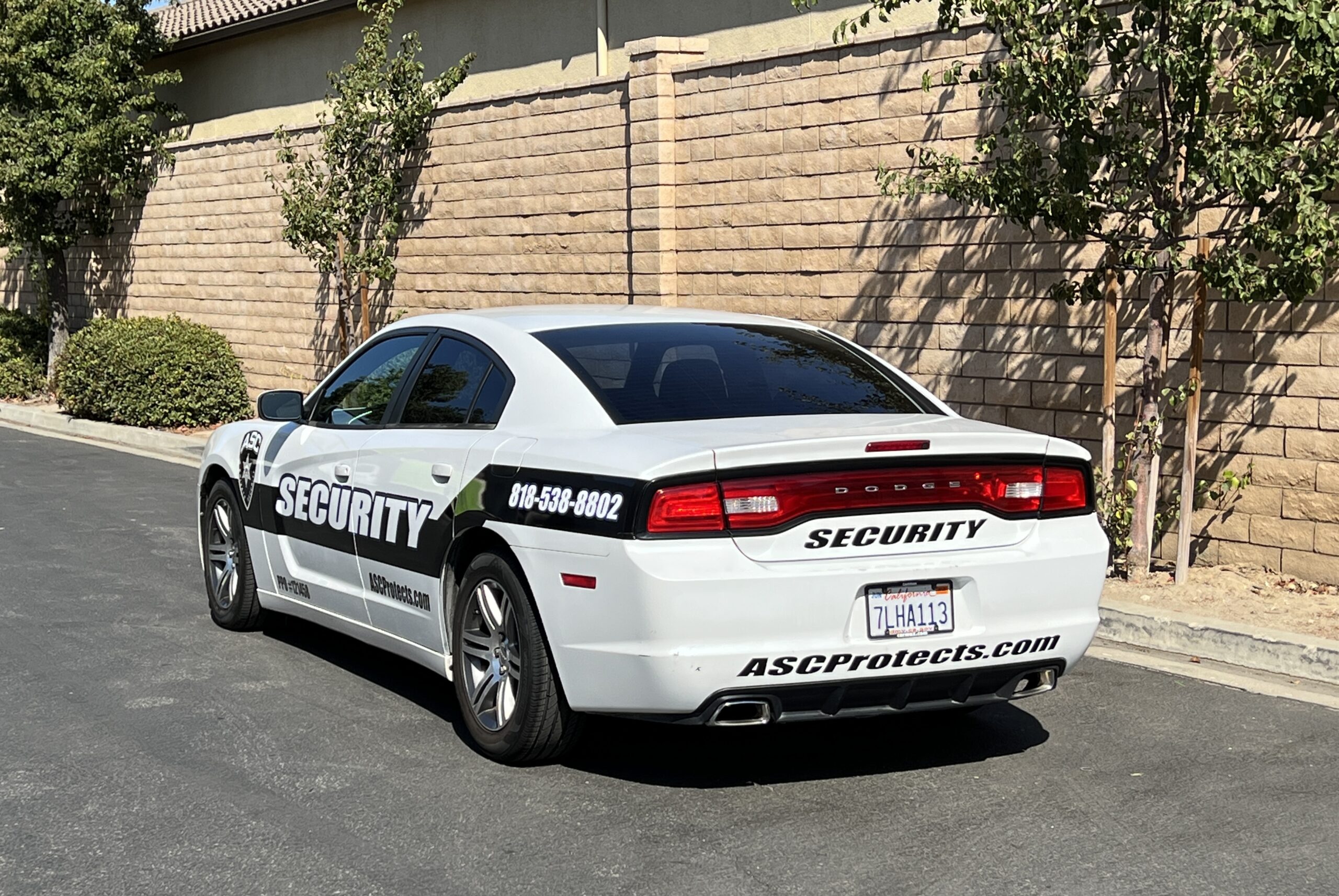Back view of ASC Private Security's mobile patrol car
