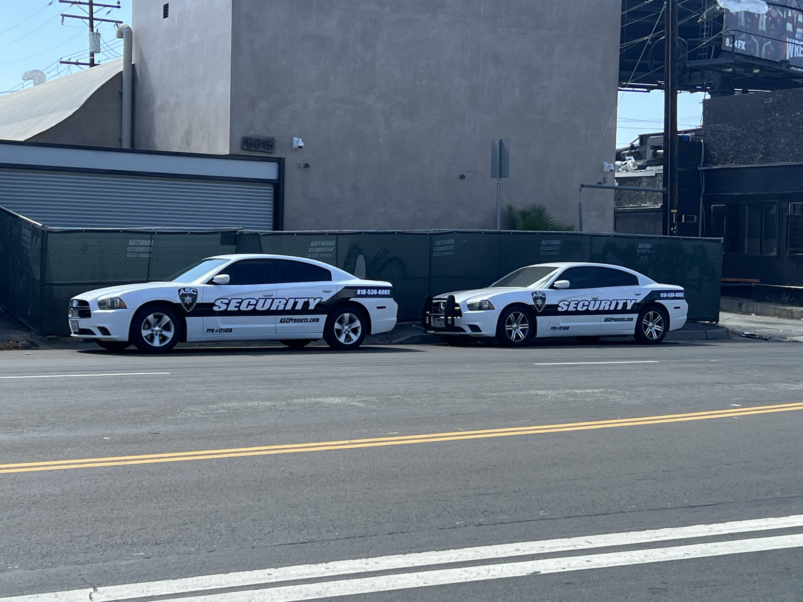 Two ASC Private Security mobile patrol cars